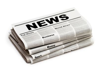 newpaper Stack of newspapers with bold NEWS headline. Sections visible are Top News, World News, Business, Money, Sport, and Home Review.